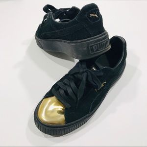 PUMA Black & Gold Platform Sneakers